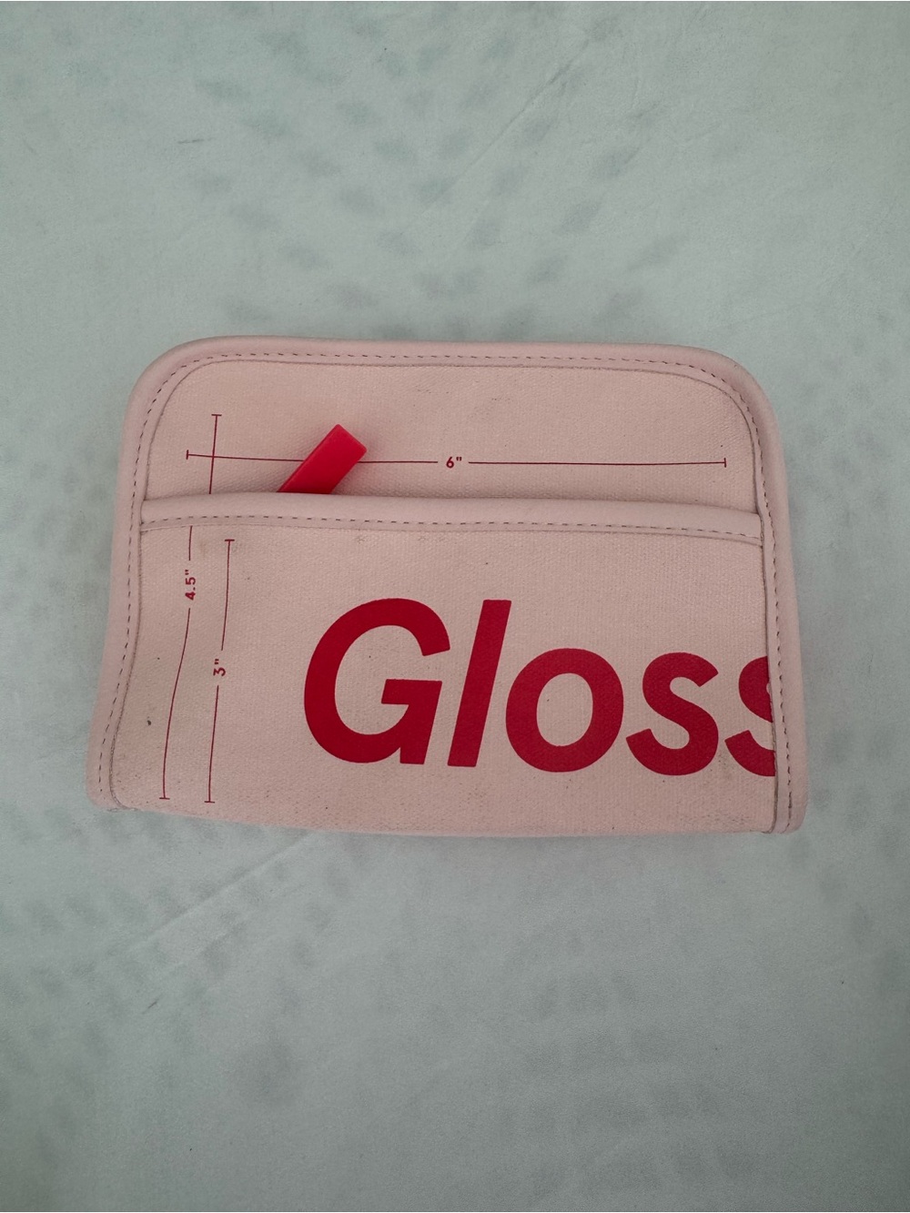 Glossier Pink Cosmetic Pouch with Red Gloss Logo